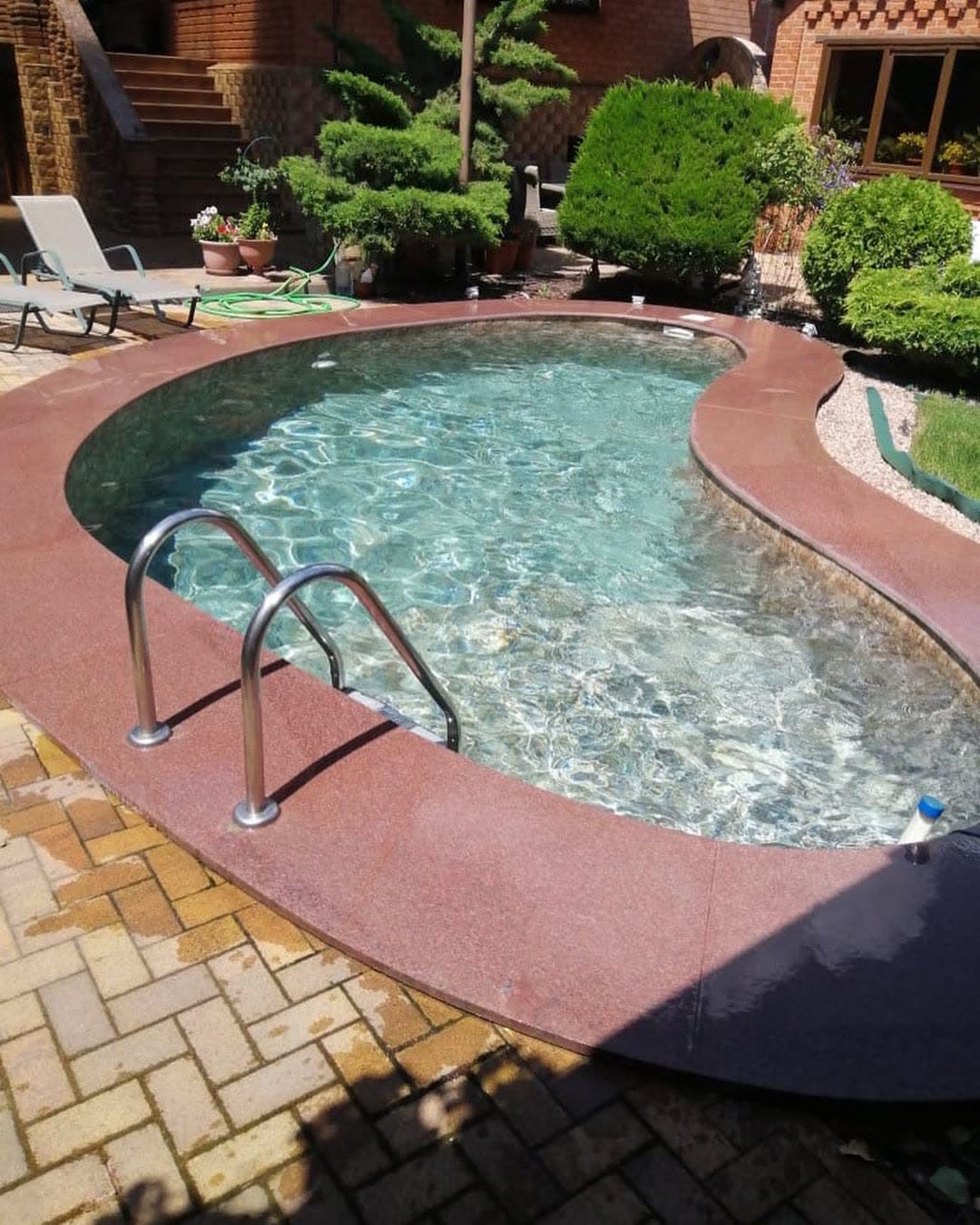 Pool water feature by QFountains